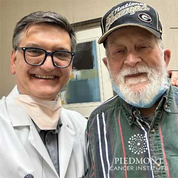 William  and Dr. Vasily Assikis, oncologist with Piedmont Cancer Insitute